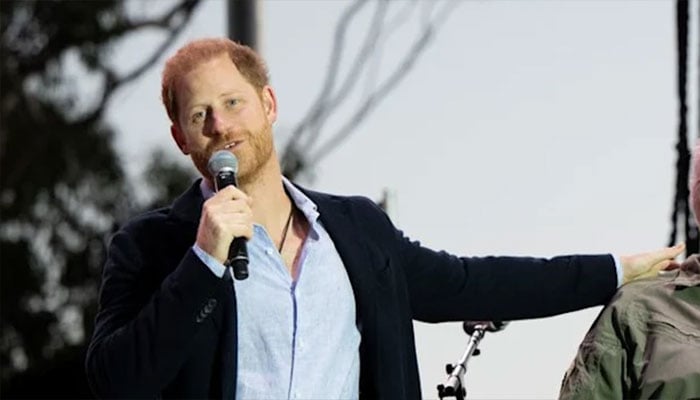 Prince Harry attends charity event.