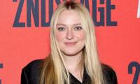 Dakota Fanning Looks Back Fondly On Childhood Debut Premiere