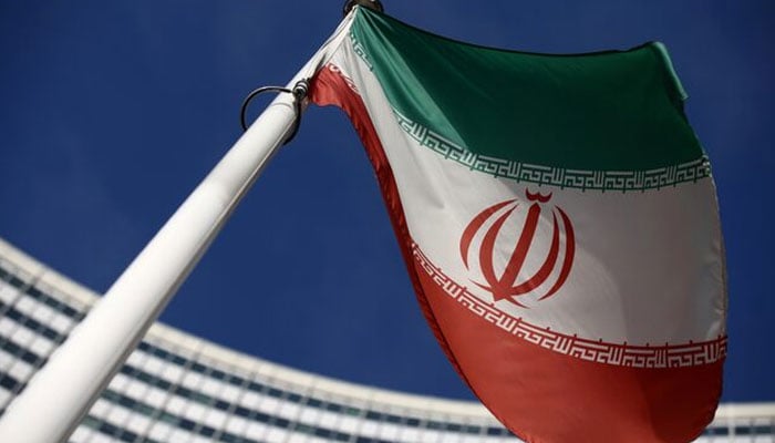 The Iranian flag waves in front of the World Atomic Energy Agency (IAEA) headquarters, sooner than the origin of a board of governors meeting, amid the coronavirus illness (COVID-19) outbreak in Vienna, Austria, March 1, 2021. — Reuters