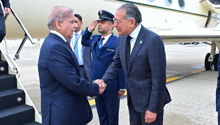 Prime Minister Shehbaz Sharif is greeted by Permanent Representative of Pakistan to the United Nations Munir Akram upon arrival in New York, US, on September 23, 2024. —X/@pmln_org