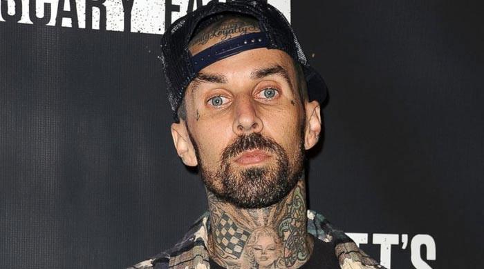 Travis Barker shares 'emotional' response to son's viral image