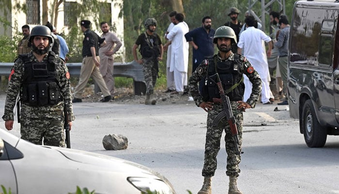 In this file photo, taken on July 18, 2023, Pakistani security personnel stand guard in Hayatabad area of Peshawar. — AFP