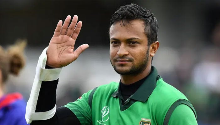 Shakib Al Hasan waves to the fans as he walks off the pitch after the match against West Indies on June 17, 2019. — AFP