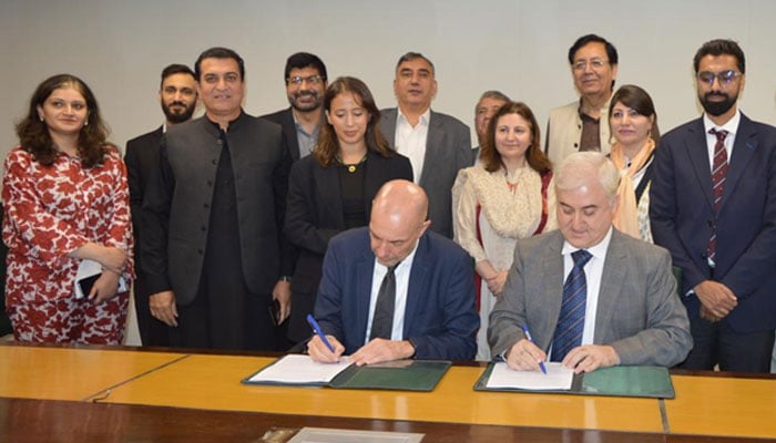 Denmarks Ambassador Jakob Linulf (left) and AKF CEO Akhtar Iqbal signing the SCRIP agreement in Islamabad on September 27, 2024. — PR