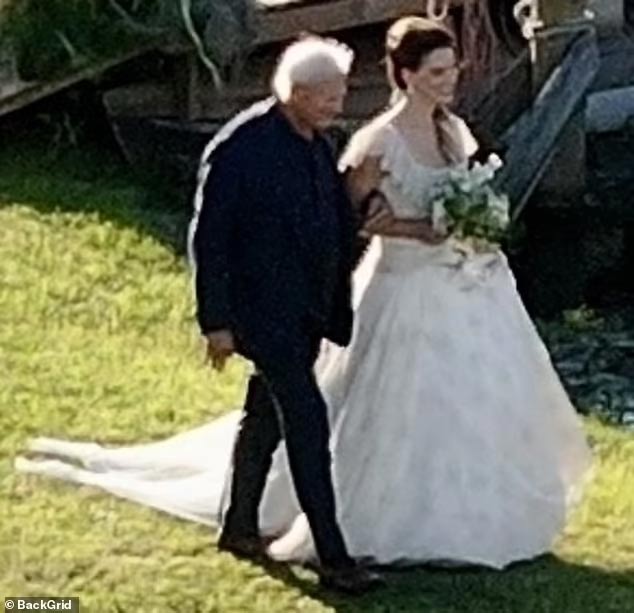 Lana Del Rey shares celebratory walk with nepo dad in shock wedding