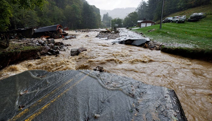 The Laurel Fork Road bridge sits destroyed from flood waters raging in the Upper Laurel Fork creek after Tropical Storm Helene struck, in Vilas, North Carolina, US September 27, 2024. — Reuters