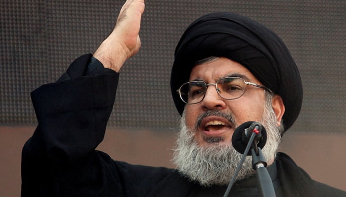 Lebanons Hezbollah leader Sayyed Hassan Nasrallah addresses his supporters during a religious procession to mark Ashura in Beiruts suburbs on November 14, 2013. — Reuters