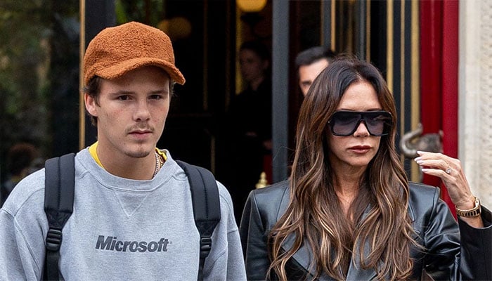 Victoria Beckham takes a break with son Cruz and girlfriend Jackie Apostel.