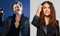 Harry Styles Makes Rare Appearance With Salma Hayek At Paris Fashion Week 