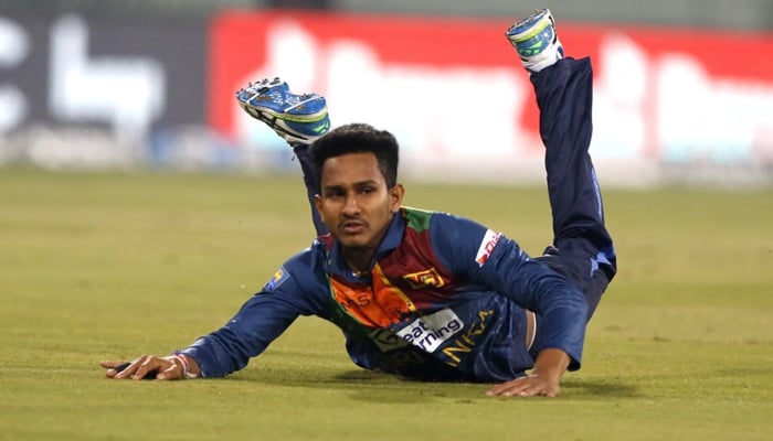 Praveen Jayawickrama dives during a T20I match against India in India on  February 24, 2024. — BCCI