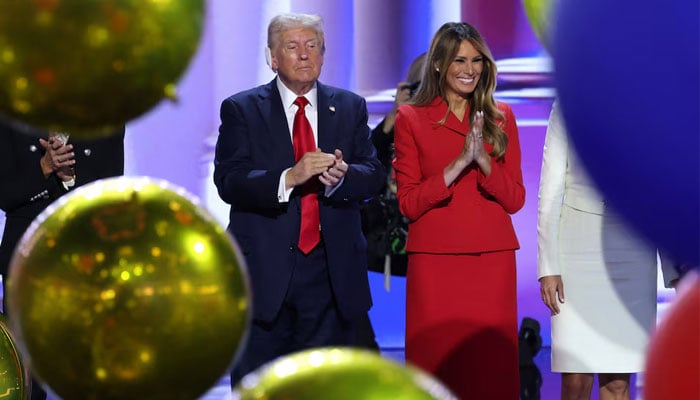 Republican presidential nominee and former US president Donald Trump is joined on stage by wife Melania after he finished giving his acceptance speech on Day 4 of the Republican National Convention (RNC), at the Fiserv Forum in Milwaukee, Wisconsin, US, on July 18, 2024. — Reuters