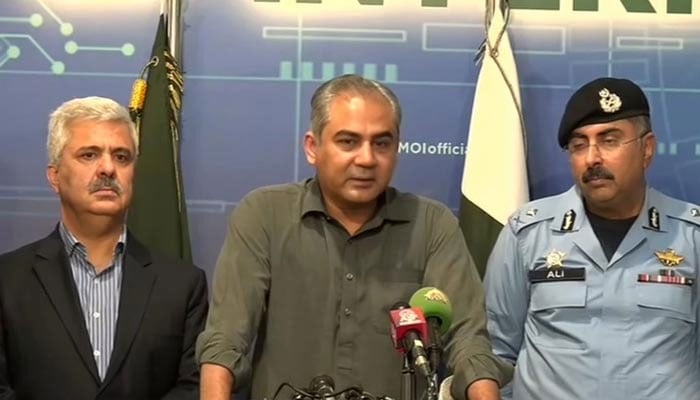 Interior Minister Mohsin Naqvi (Centre) addressing a press conference in Islamabad on October 3, 2024. — Screengrab via Geo News