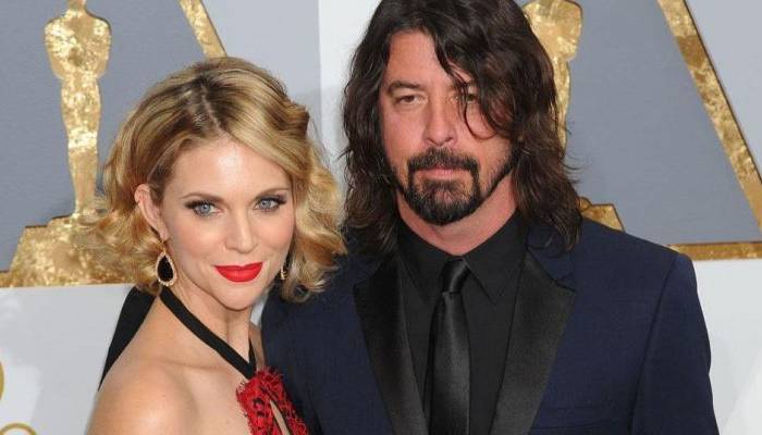 The Foo Fighters frontman and his wife were separately spotted without rings