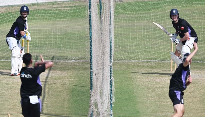 Englands Zak Crawley (R) and Ben Duckett (L) bat during a practice session at the Multan Cricket Stadium in Multan on October 4, 2024. —AFP