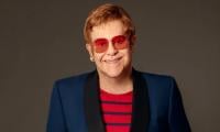 Elton John Loves Bringing 'incredible' 'Tammy Faye' Music To Life 