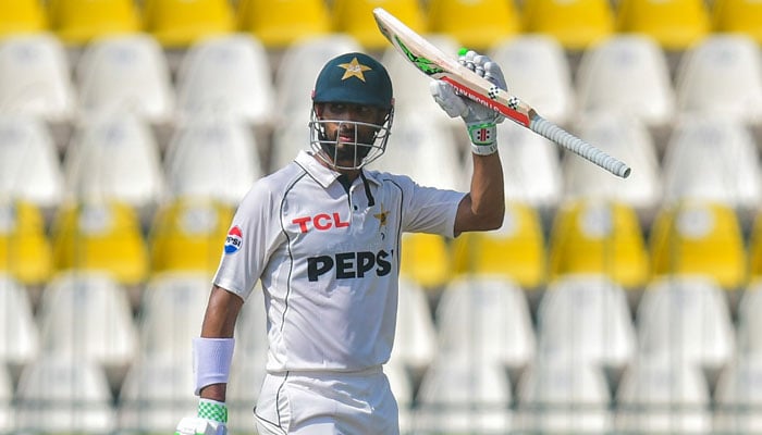 Pakistan skipper Shan Masood celebrates scoring a century in the first Test against England in Multan on October 7, 2024. — PCB