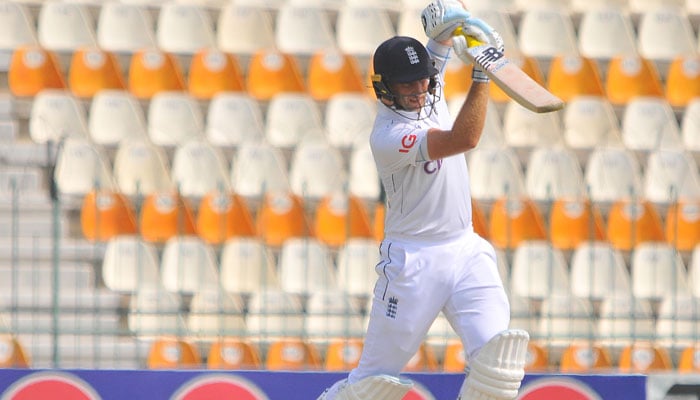 Englands Joe Root plays a shot on the third day of first Test at Multan Cricket Stadium on October 9, 2024. — PCB