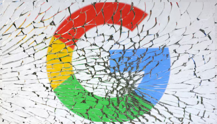 Google logo is seen through broken glass in this illustration taken, 25 January 2023. — Reuters