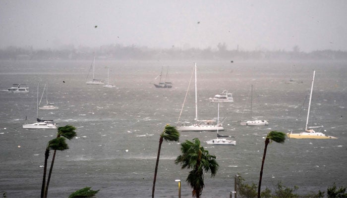 Wind and rain batter the area as Hurricane Milton approaches in Sarasota, Florida on October 9, 2024. — AFP