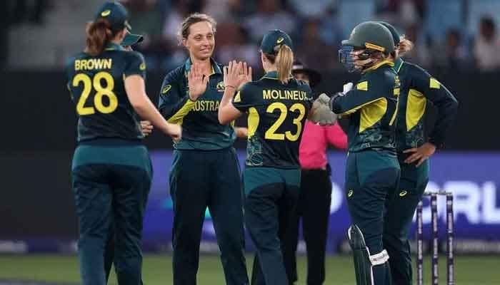 Australian women cricket team, defending champions of the event, celebrating a wicket against Pakistan during the Womens T20 World Cup 2024. — ICC