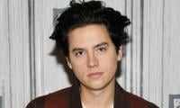 Cole Sprouse's Expressionless Vacation Photos Spark Hilarious Fan Reactions