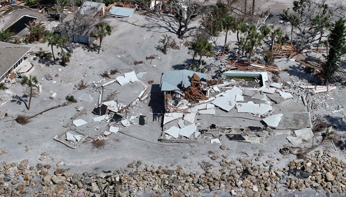 An aerial view showing homes along the Gulf of Mexico after they were destroyed when Hurricane Milton passed through the area on October 12, 2024, in Manasota Key, Florida. — AFP