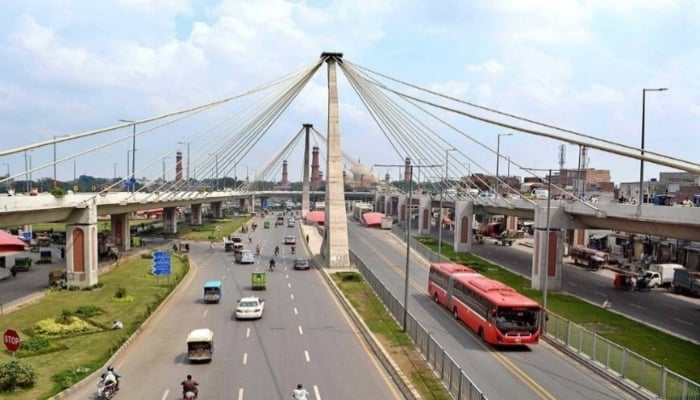 A Metro bus is plying on a road on the right side. — Punjab Transport & Mass Transit Department website/ File