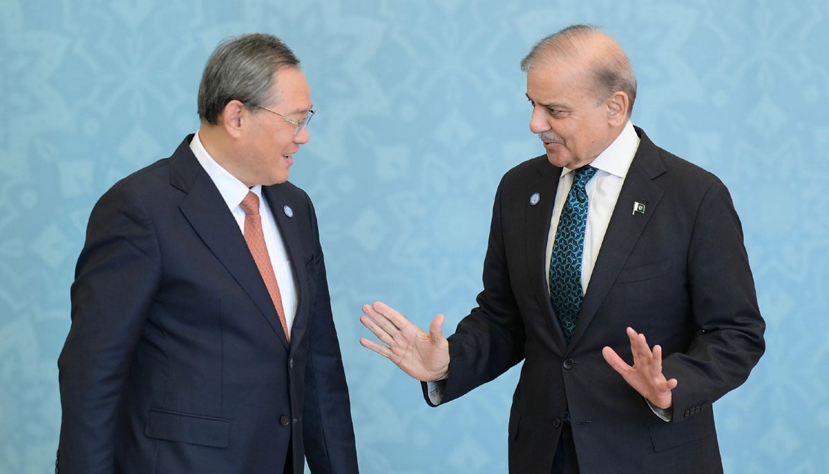 PM Shehbaz Sharif receives Chinese Premier Li Qiang at the Jinnah Convention Centre for the SCO summit in Islamabad on October 16, 2024. — PID