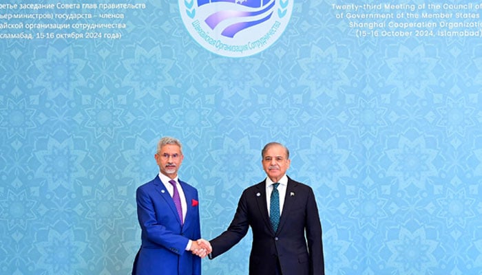 Prime Minister Shehbaz Sharif (right) shaking hands with India´s Foreign Minister Subrahmanyam Jaishankar during the Shanghai Cooperation Organisation (SCO) summit, in Islamabad on October 16, 2024, as seen in this handout photograph released by Pakistan´s Press Information Department. — AFP