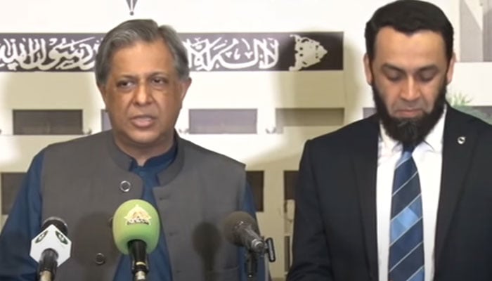 Law Minister Azam Nazeer Tarar (left) and Information Minister Attaullah Tarar address the press conference in Parliament House on October 20, 2024. — Screengrab via Geo News