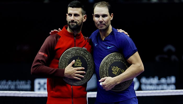 Serbias Novak Djokovic (left) and Spanish Spains Rafael Nadal pose after their third place match in the Six Kings Slam tournament in Riyadh, Saudi Arabia on October 19, 2024. — Reuters