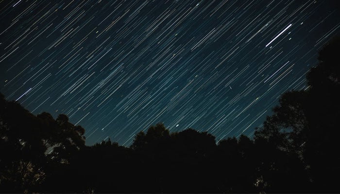 A representational image shows a meteor shower in the sky at night. — Pexels