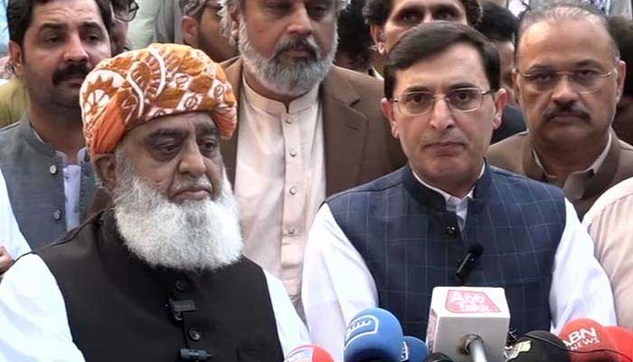 PTI Chairman Barrister Gohar Ali Khan and JUI-F chief Maulana Fazlur Rehman speak to journalists in Islamabad, on October 20, 2024. — Screengrab via Geo News