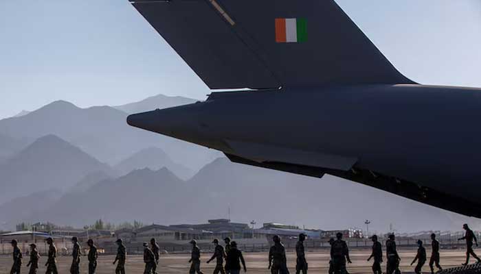 Indian soldiers disembark from a military transport plane at a forward airbase in Leh, in the Ladakh region, September 15, 2020. — Reuters