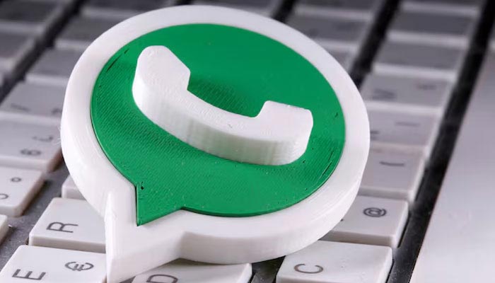 A 3D-printed Whatsapp logo is placed on the keyboard in this illustration taken April 12, 2020. — Reuters