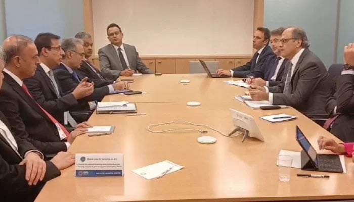 The Pakistani delegation (left) meets an IMF team in Washington, DC, on October 22, 2024. — APP