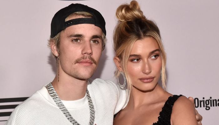 Justin Bieber and Hailey were spotted leaving their office in sleek Tesla vehicle.