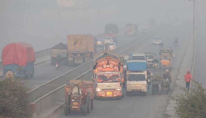 Vehicles move amid dense smog in Lahore, Pakistan November 24, 2021. — Reuters