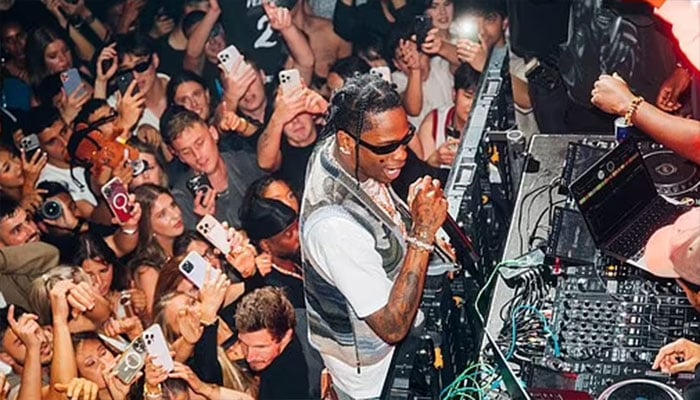 Travis Scott throws wild afterparty for fans.