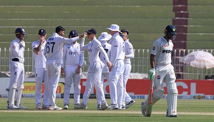 Pakistans Shan Masood walks after losing his wicket during the third Test between England and Pakistan at the Rawalpindi Cricket Stadium, in Rawalpindi, Pakistan, on October 25, 2024. — Reuters