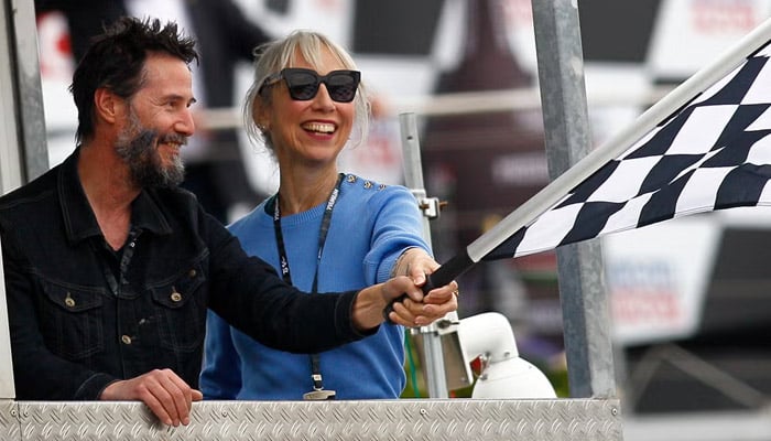 Keanu Reeves and Alexandra Grant locked hands during their latest outing