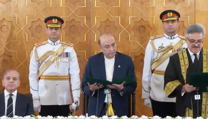 (Left to right) Prime Minister Shehbaz Sharif, President Asif Ali Zardari, and CJP Yahya Afridi during the oath-taking ceremony of the top judge, at the Aiwan-e-Sadar in Islamabad, on October 26, 2024. — Screengrab via Geo News