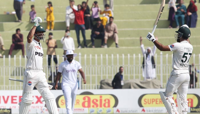 Pakistans skipper Shan Masood and Abdullah Shafique react after winning the third and final Test against England at the Rawalpindi Cricket Stadium on October 26, 2024. — PCB