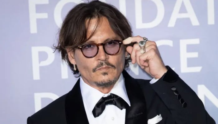 Johnny Depp steps behind the camera for Modi