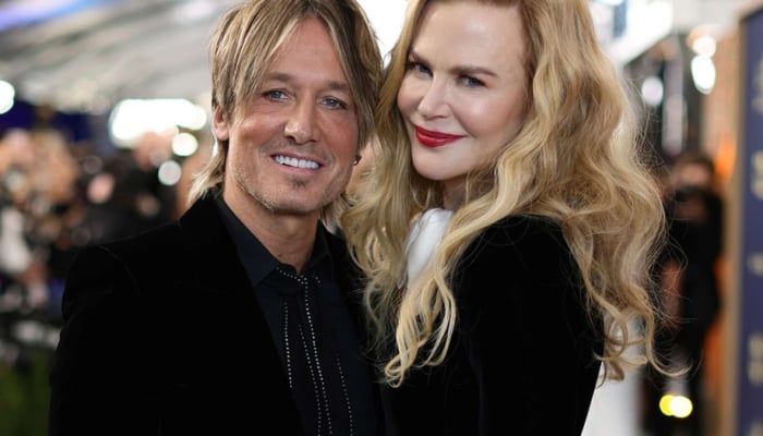 Nicole Kidman puts on loved up display at first appearance after moms funeral