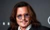 Johnny Depp presented with lifetime achievement award at Rome Film Festival