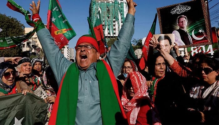 PTI supporters chant slogans during a protest in Karachi on February 17, 2024. — Reuters