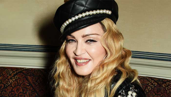 Madonna escapes her grieving period as she supports son Rocco Ritche