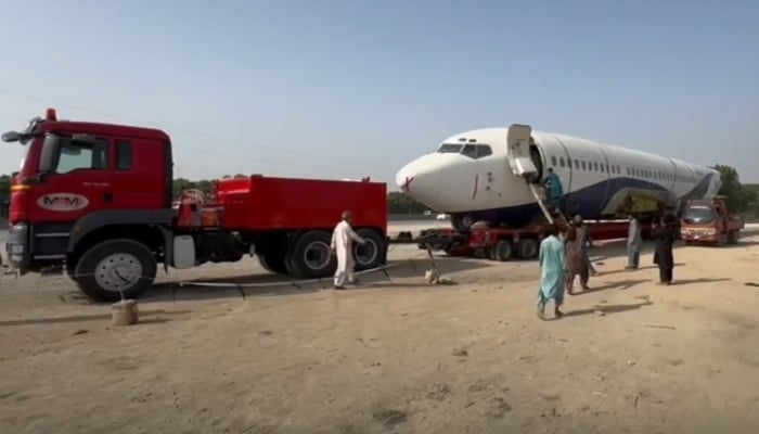 Fuselage of the private plane being readied for transportation to Hyderabad from Karachi on October 24, 2024. —Screengrab/ Reporter