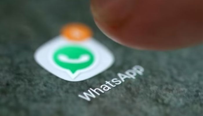 A representational image showing the WhatsApp app icon on a phone screen. — Reuters/File